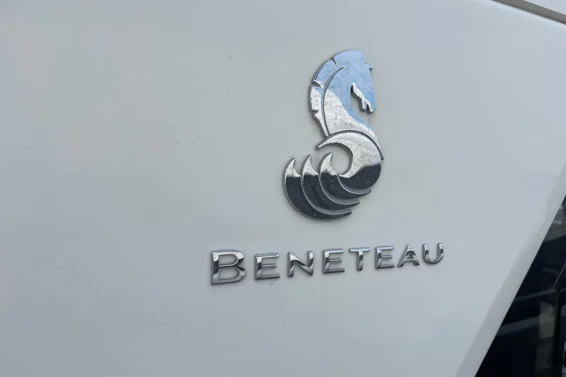 Slide: The Image of Beneteau Swift Trawler 35 logo on 2018 model boat exterior. - 13