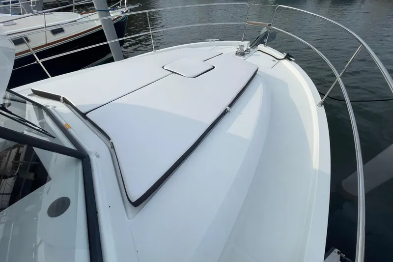 Slide: The Image of 2018 Beneteau Swift Trawler 35 deck view with sleek design and railing. - 17