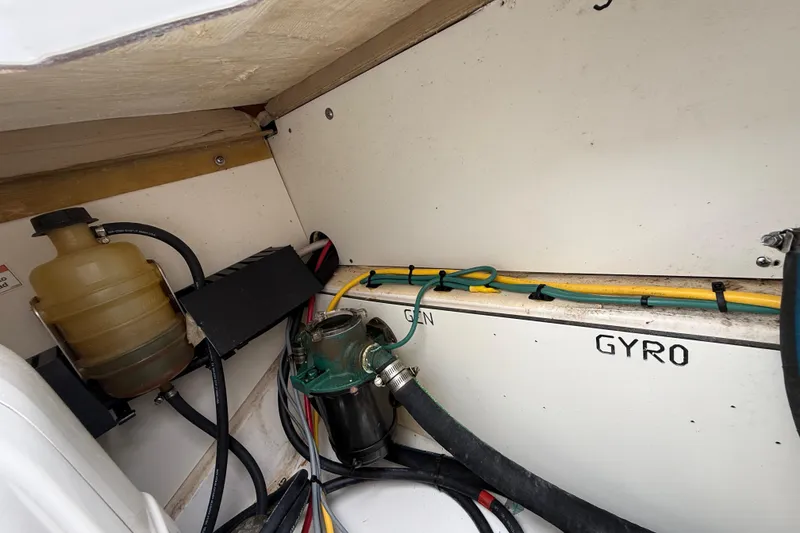 Slide: The Image of 2022 Pursuit S 358 Sport boat interior wiring and components labeled "GEN" and "GYRO". - 110