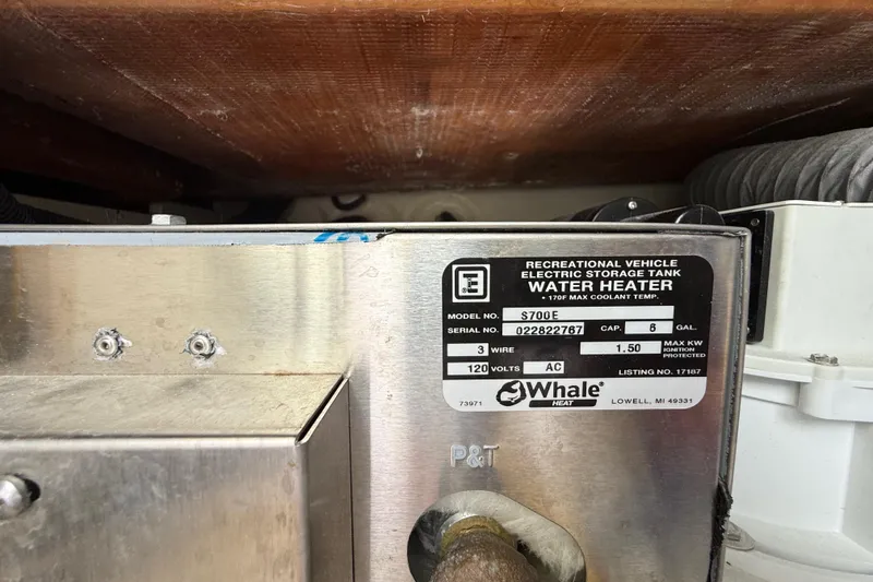 Slide: The Image of Water heater label on 2022 Pursuit S 358 Sport, model S700E, 6-gallon capacity. - 120