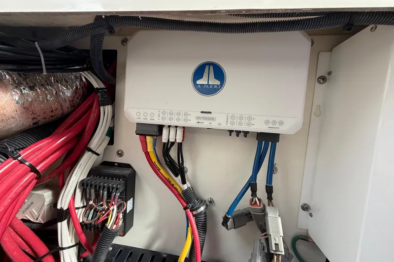 Slide: The Image of 2022 Pursuit S 358 Sport boat audio system wiring with JL Audio amplifier. - 123