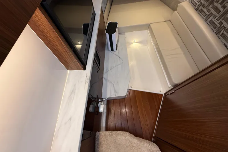 Slide: The Image of 2022 Pursuit S 358 Sport interior with modern wood and leather finishes. - 135