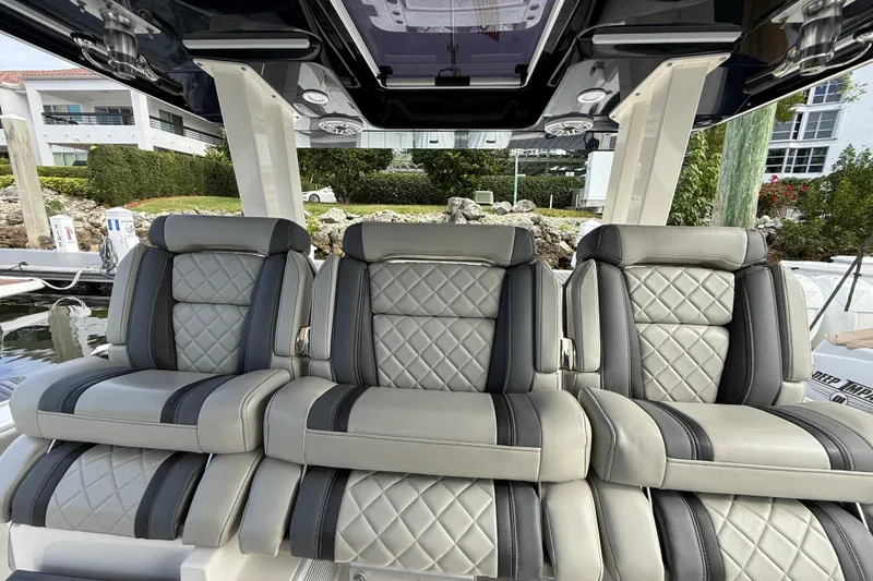 Slide: The Image of Luxurious seating on 2022 Pursuit S 358 Sport boat, featuring quilted leather upholstery. - 53