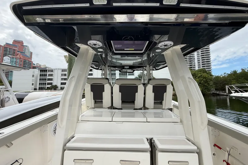 Slide: The Image of 2022 Pursuit S 358 Sport boat interior with modern seating and sleek design. - 72