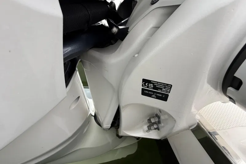 Slide: The Image of Close-up of 2022 Pursuit S 358 Sport boat engine detail. - 88