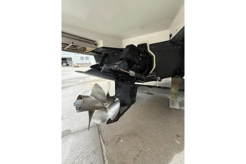 Slide: The Image of 2011 Sea Ray 250 SLX boat propeller and stern drive detail. - 14