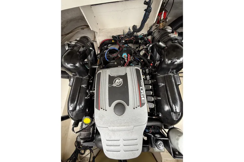 Slide: The Image of Engine of 2011 Sea Ray 250 SLX boat, featuring MerCruiser 350 MAG. - 19
