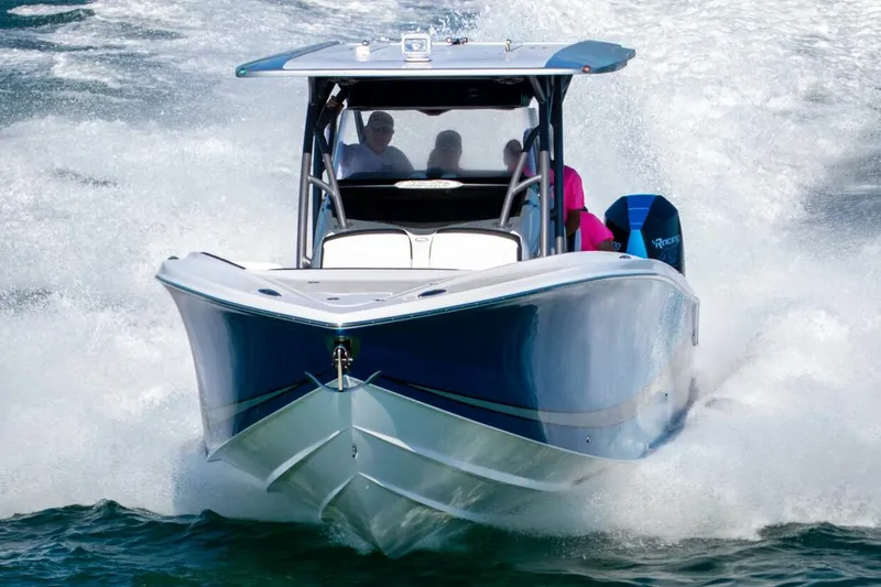 Slide: The Image of Storage area in 2023 Nor-Tech 390 Sport Center Console with life jackets. - 20