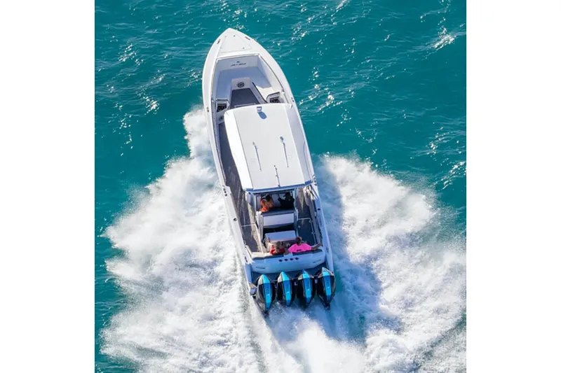 Slide: The Image of 2023 Nor-Tech 390 Sport Center Console interior with speakers and stylish flooring. - 21