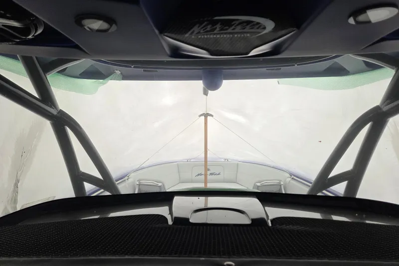 Slide: The Image of 2023 Nor-Tech 390 Sport Center Console interior view with sleek design elements. - 45