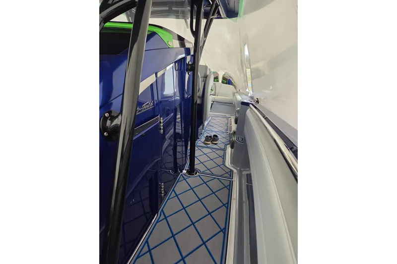 Slide: The Image of 2023 Nor-Tech 390 Sport Center Console interior with sleek design and modern features. - 57