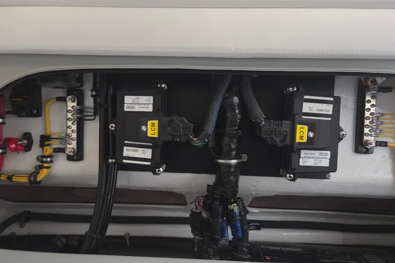 Slide: The Image of 2023 Nor-Tech 390 Sport Center Console electrical system with labeled components and wiring. - 63