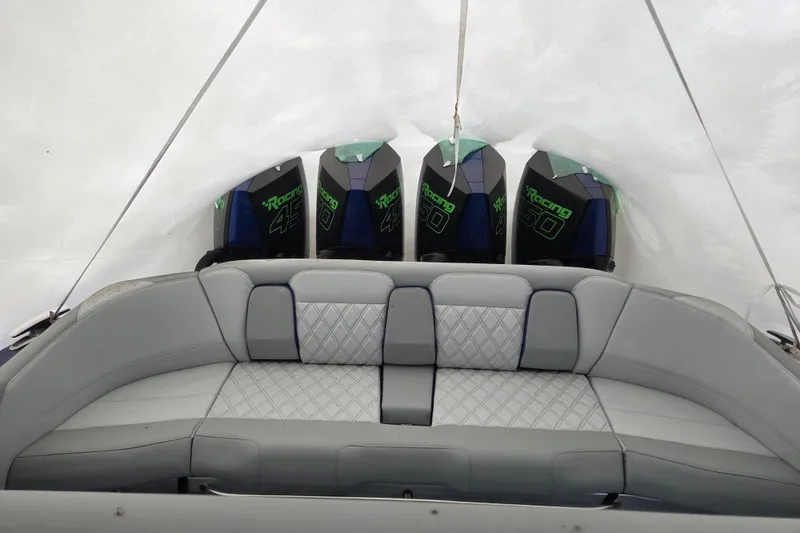 Slide: The Image of 2023 Nor-Tech 390 Sport Center Console with quad 450R engines and luxurious seating. - 67