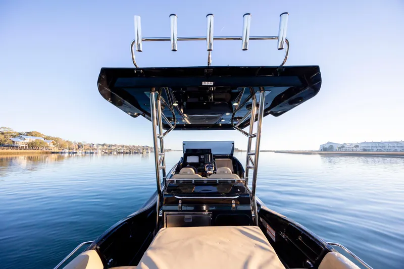 Slide: The Image of 2020 Zar Formenti 95 SL boat on calm water, showcasing sleek design and modern features. - 17