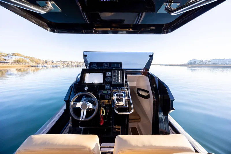 Slide: The Image of Cockpit view of 2020 Zar Formenti 95 SL boat on calm water. - 21