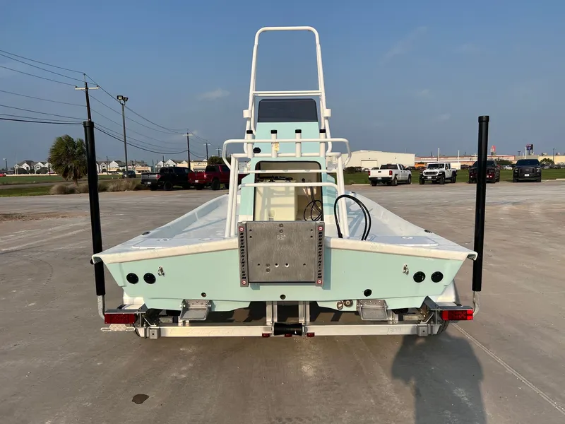 Slide: The Image of Shoalwater 19 CAT 2026 boat with Yamaha engine on trailer. - 10