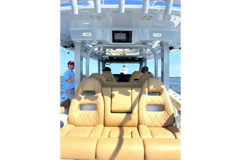 Slide: The Image of Luxurious interior of 2026 Freeman 47 boat with tan leather seating. - 11