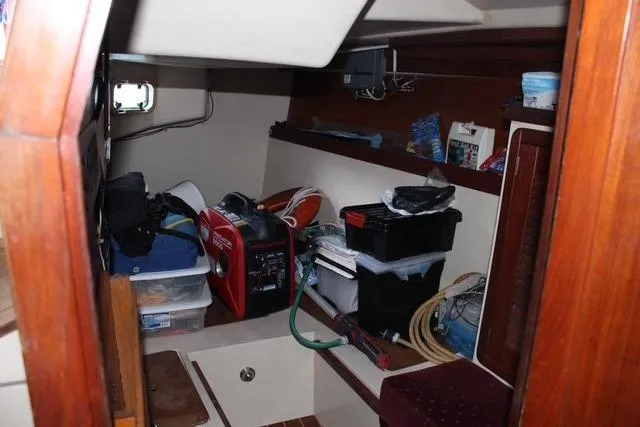 Slide: The Image of Interior of a 1989 Catalina 42 sailboat with storage and equipment. - 47