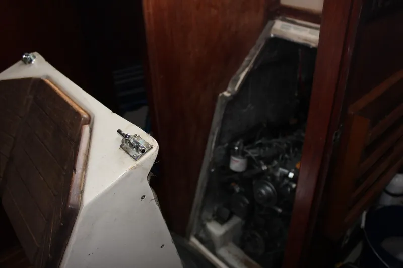 Slide: The Image of Engine compartment of a 1989 Catalina 42 sailboat, showing interior details. - 48