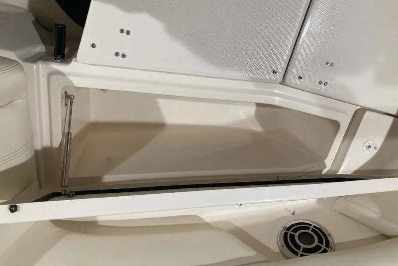 Slide: The Image of Storage compartment in 2015 Grady-White Freedom 275 boat interior. - 23
