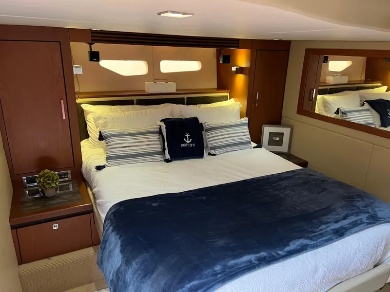 Slide: The Image of Luxurious bedroom interior of 2014 Sea Ray 510 Sundancer yacht with elegant bedding. - 16