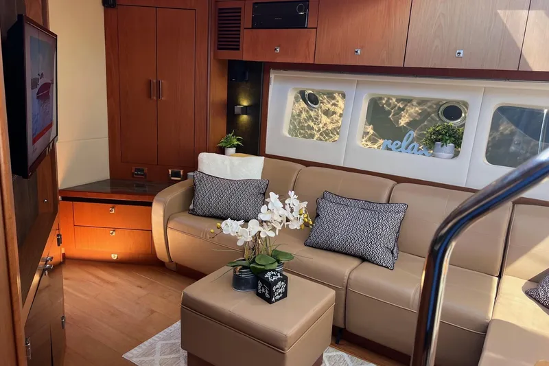 Slide: The Image of Luxurious interior of 2014 Sea Ray 510 Sundancer yacht with elegant seating and decor. - 35