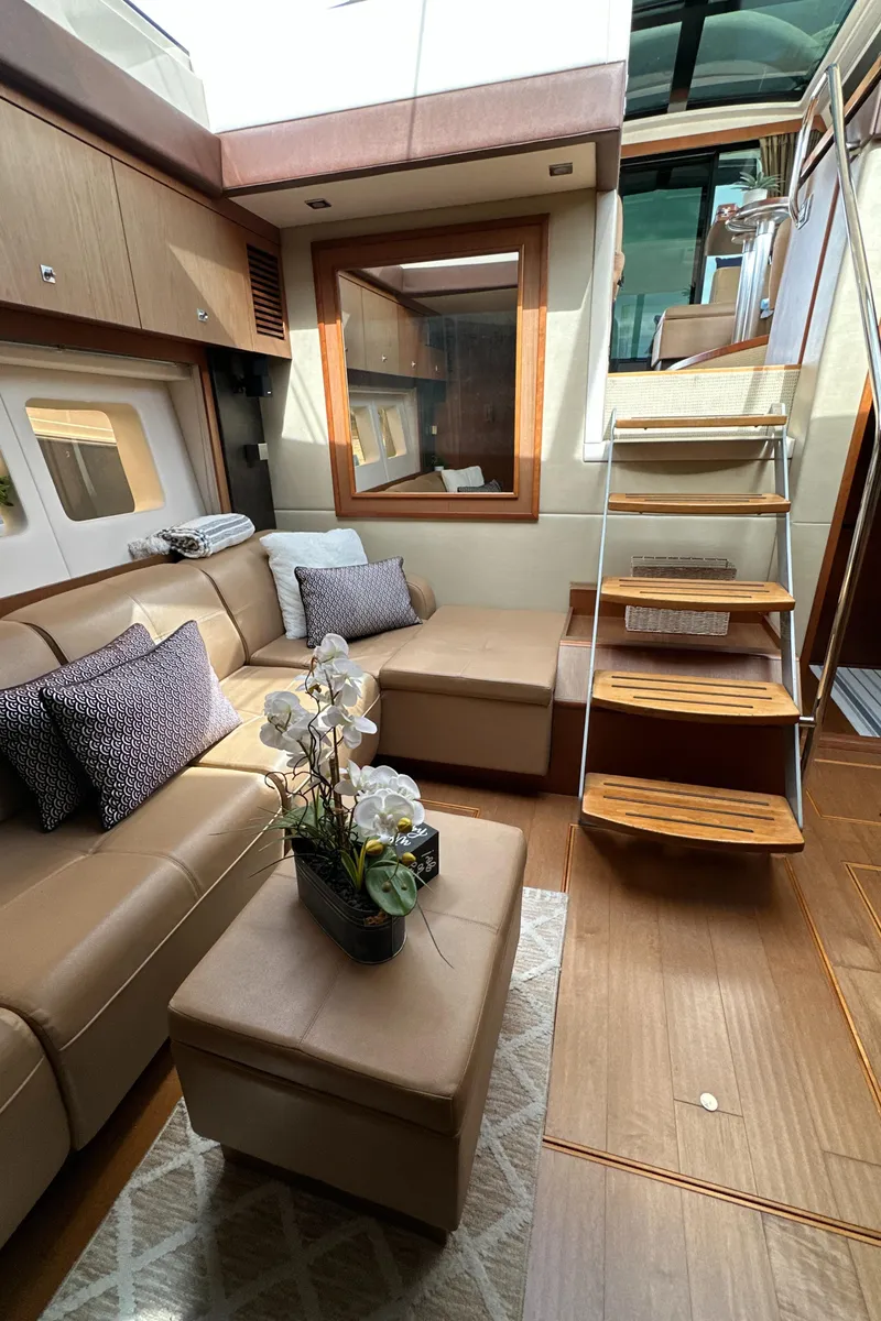 Slide: The Image of Luxurious interior of 2014 Sea Ray 510 Sundancer yacht with elegant seating and modern design. - 41
