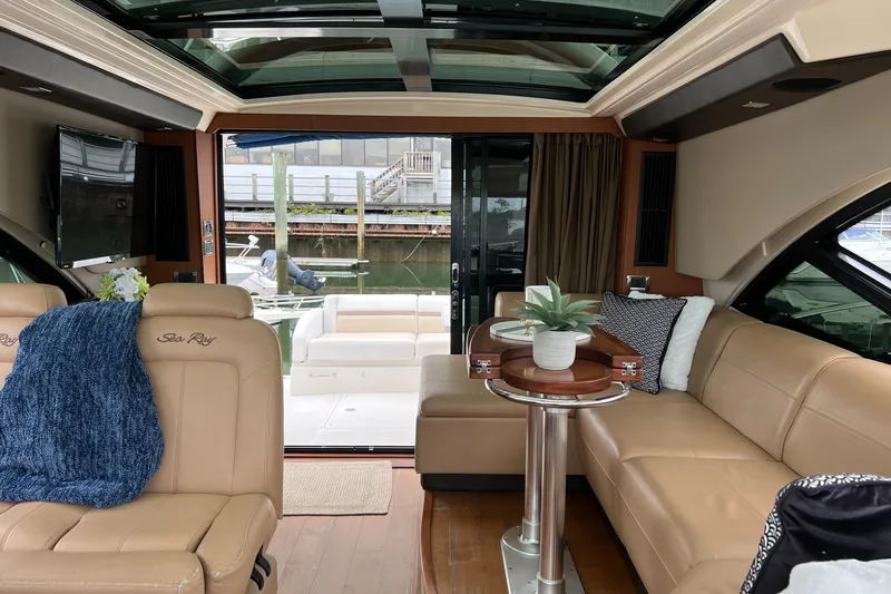 Slide: The Image of Luxurious interior of 2014 Sea Ray 510 Sundancer yacht with leather seating and elegant decor. - 9