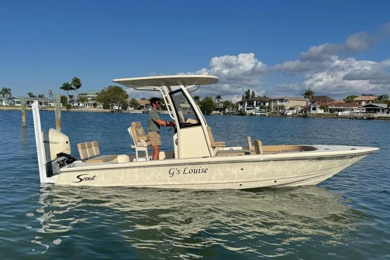 The Image of 2024 Scout 231 XSB boat on calm water. - 0