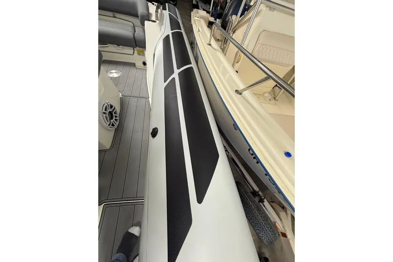 Slide: The Image of 2026 Brig Eagle 8 boat interior with sleek design and modern features. - 13