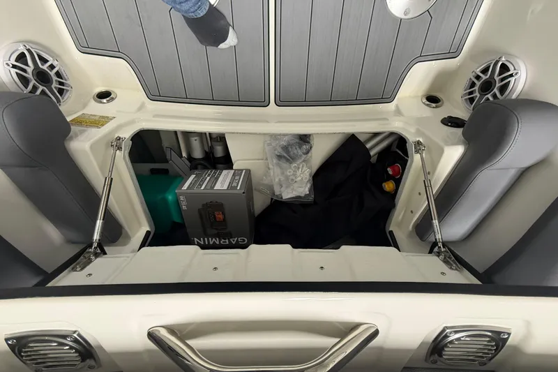Slide: The Image of Interior storage compartment of 2026 Brig Eagle 8 boat with Garmin equipment. - 17