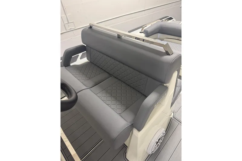 Slide: The Image of 2026 Brig Eagle 8 boat interior with gray quilted seating and modern design. - 24