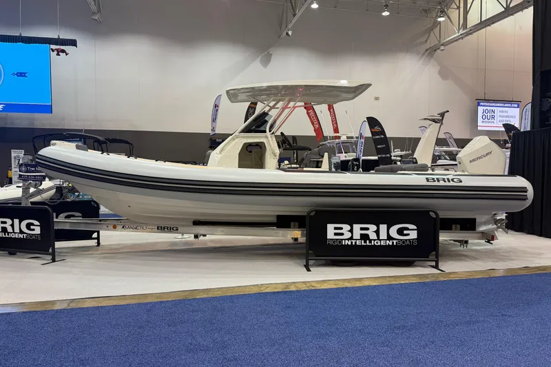 Slide: The Image of 2026 Brig Eagle 8 boat displayed at an indoor exhibition, showcasing sleek design. - 28