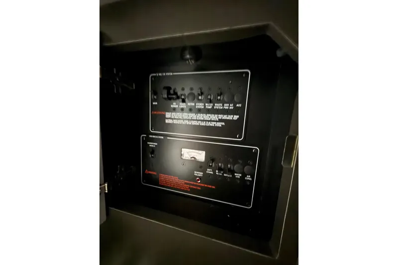 Slide: The Image of Control panel inside 2023 Formula 330 Crossover Bowrider I/O boat. - 13