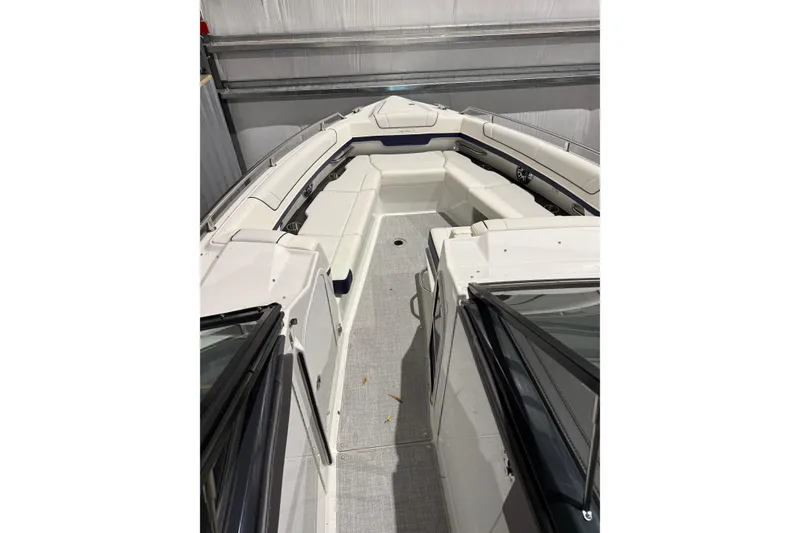 Slide: The Image of 2023 Formula 330 Crossover Bowrider I/O interior with spacious seating and sleek design. - 14