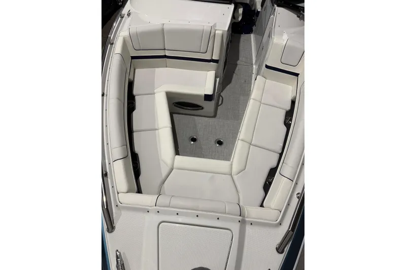 Slide: The Image of 2023 Formula 330 Crossover Bowrider I/O with spacious white seating area. - 15