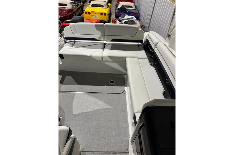 Slide: The Image of 2023 Formula 330 Crossover Bowrider I/O interior with spacious seating and modern design. - 20