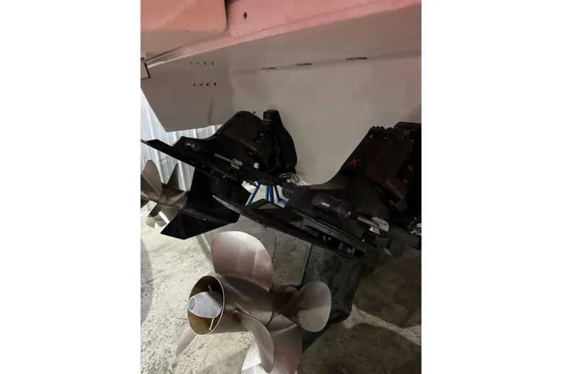 Slide: The Image of 2023 Formula 330 Crossover Bowrider I/O propellers and stern drive detail. - 5