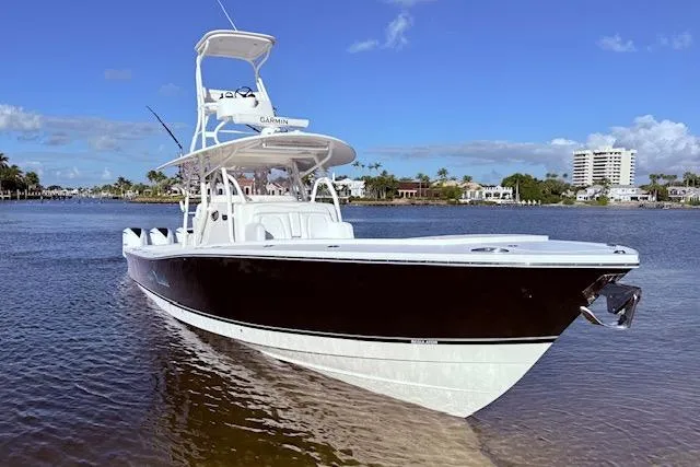 Slide: The Image of 2017 Regulator 41 boat on calm water with clear blue sky background. - 3
