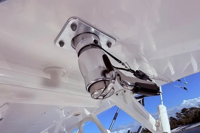 Slide: The Image of Close-up of a 2017 Regulator 41 boat's mounted spotlight under a clear blue sky. - 43