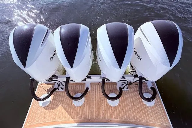 Slide: The Image of Four Yamaha outboard engines on a 2017 Regulator 41 boat, viewed from above. - 50