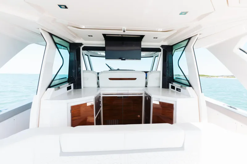 Slide: The Image of Interior of 2023 Tiara 48 yacht with modern design and ocean view. - 46