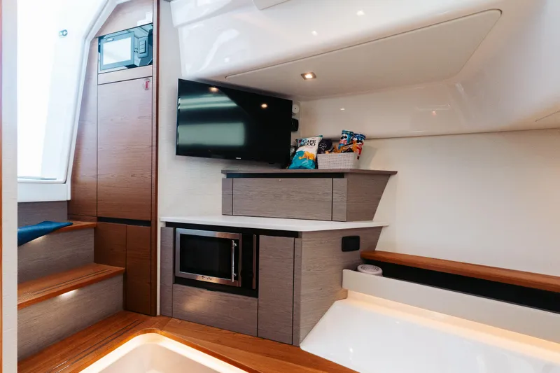 Slide: The Image of Luxurious interior of 2023 Tiara 48 yacht with modern amenities and sleek design. - 59