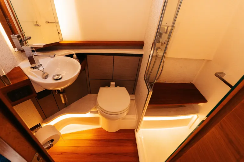 Slide: The Image of Luxurious bathroom in 2023 Tiara 48 yacht with modern fixtures and elegant lighting. - 60