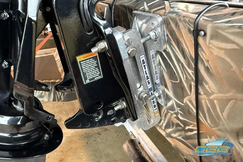 Slide: The Image of 2022 SeaArk 180 RXT boat interior with camouflage design and SeaArk logo. - 21