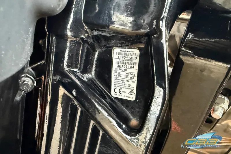 Slide: The Image of 2022 SeaArk 180 RXT boat on trailer, featuring camo design and powerful outboard motor. - 26