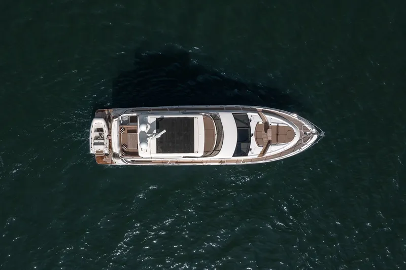 Slide: The Image of Aerial view of a 2018 Sea Ray L650 Fly on the water. - 10