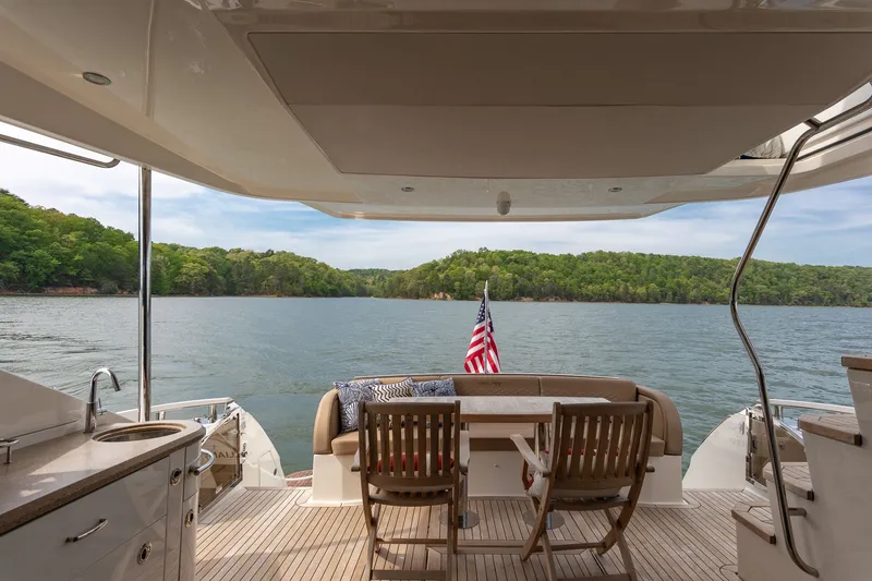 Slide: The Image of Luxurious Sea Ray L650 Fly yacht interior with lake view. - 14