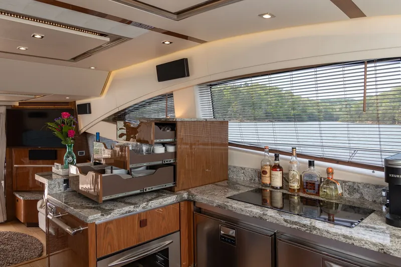 Slide: The Image of Luxurious kitchen on a 2018 Sea Ray L650 Fly yacht. - 23