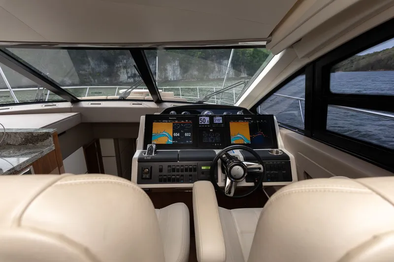 Slide: The Image of Interior view of 2018 Sea Ray L650 Fly cockpit. - 25